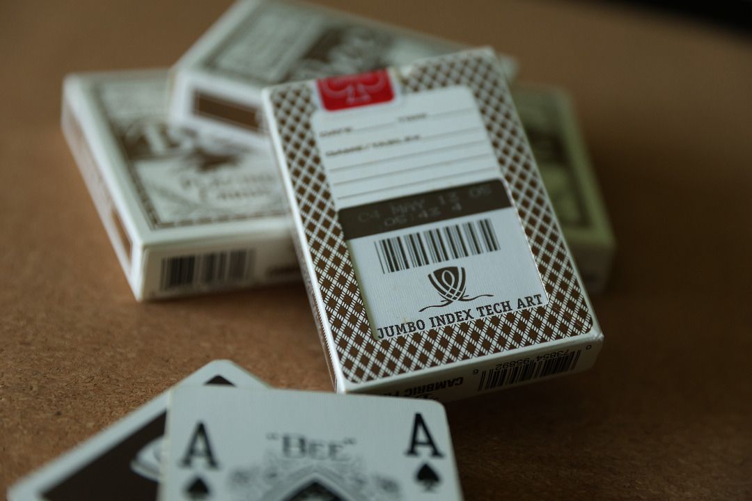 Brown Wynn Playing Cards — authentic Wynn Las Vegas casino deck, with window display