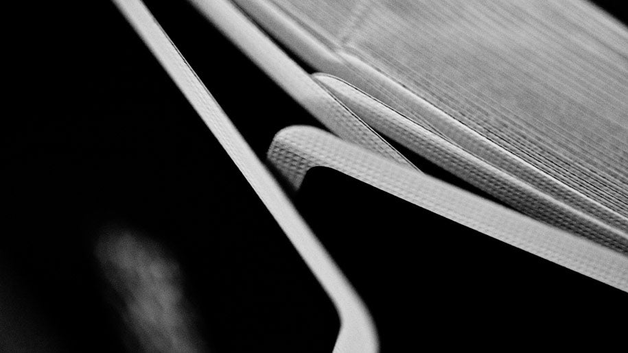 Close-up of Madison Black Rounders in faro shuffle