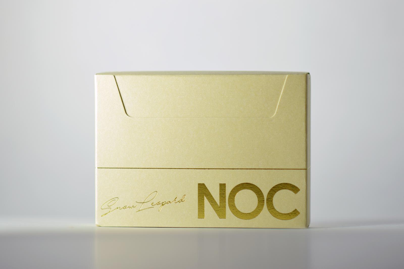 NOC Snow Leopard Signature gold foiling on tuck box