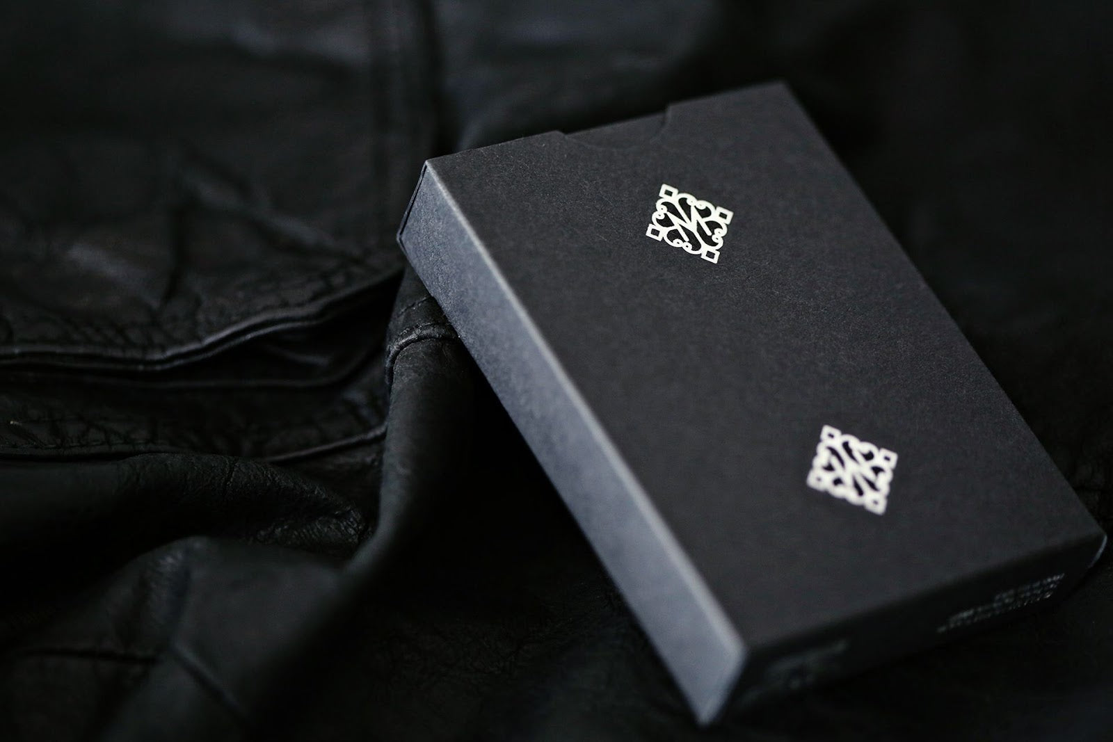 Madison Rounders White Playing Cards — premium black tuck box with silver foil logo by Daniel Madison
